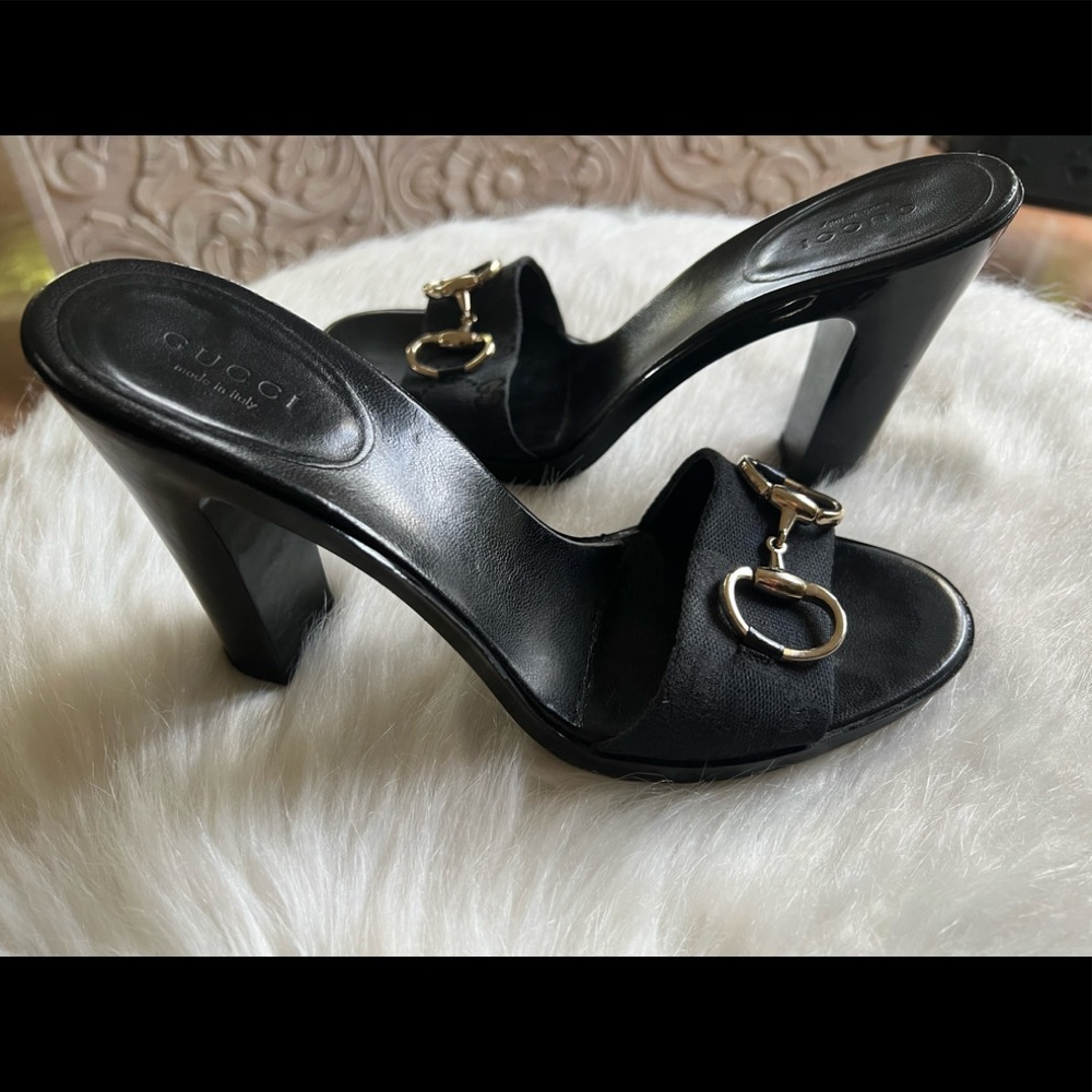 Gucci Black Mules with Gold Accents